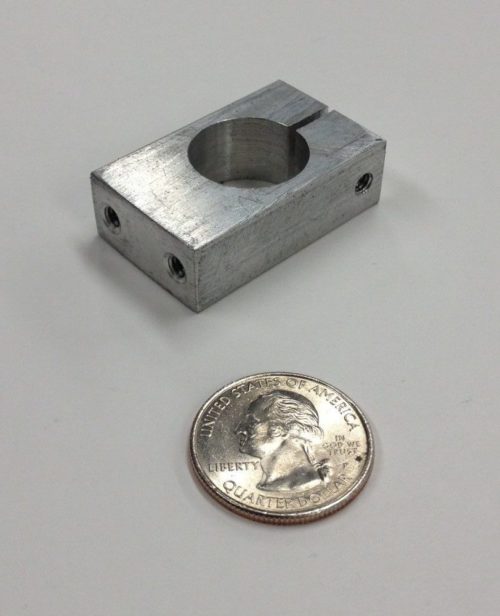 An aluminum shaft holder machined to customer specifications.