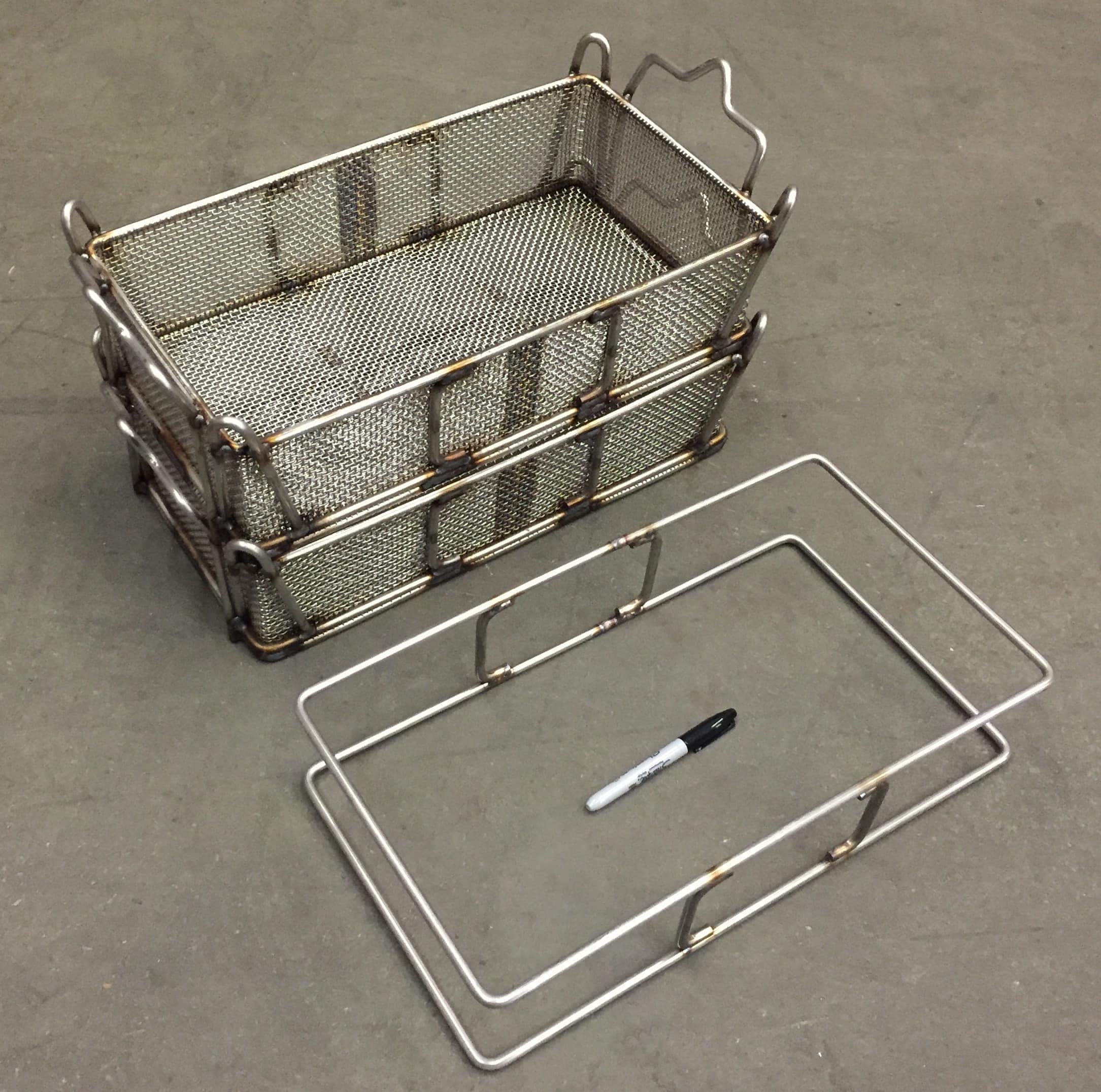 Two stackable wire baskets and an unfinished frame